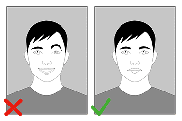 Can you smile in a British UK Passport Photo